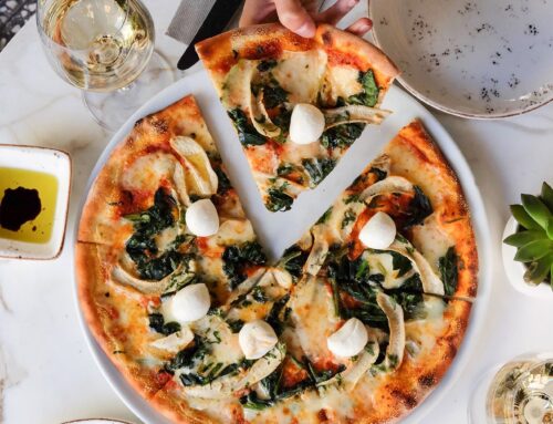 Thin crust spinach and mozzarella pizza